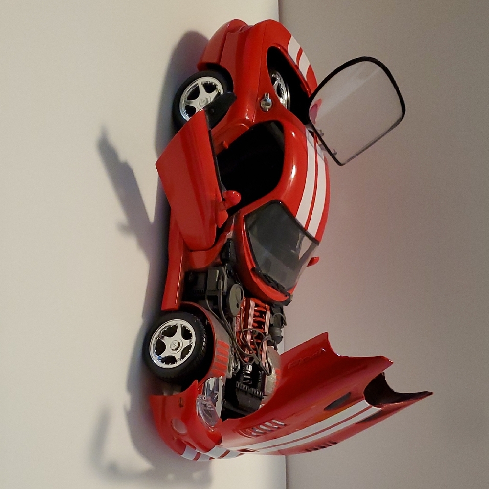 Speedy Red Toy Sports Car with Opening Doors